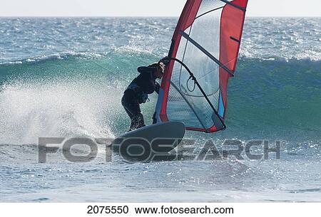 Stock Image - Windsurfing; Tarifa Cadiz Andalusia Spain. Fotosearch