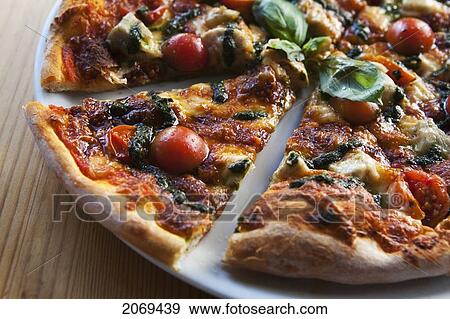 Stock Photo - Wood-Fired Traditional Italian Pizza; Kirra Gold Coast Queensland Australia. Fotosearch