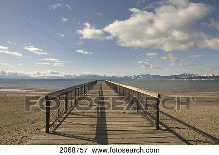 Wooden Dock Into Lake Tahoe; Nevada United States Of America View Large Photo Image Stock Photo - Wooden Dock Into Lake Tahoe; Nevada United States Of America. Fotosearch