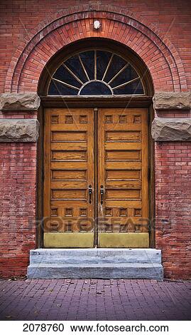 Stock Image - Wooden doors of public archives; edmonton alberta canada. Fotosearch