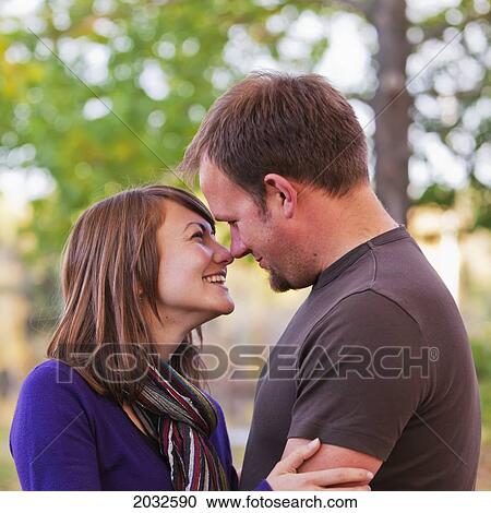 Young Married Couple Spending Quality Time Together In A Park In Autumn; Edmonton Alberta Canada View Large Photo Image Stock Image - Young Married Couple Spending Quality Time Together In A Park In Autumn; Edmonton Alberta Canada. Fotosearch