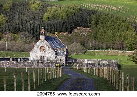 Stock Photography - A church and cemetery; scottish borders, scotland. Fotosearch