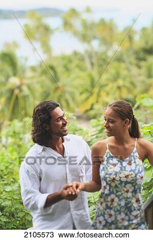 A couple in love at bora bora nui resort and spa; bora bora island society islands french polynesia south pacific View Large Photo Image Stock Image - A couple in love at bora bora nui resort and spa; bora bora island society islands french polynesia south pacific. Fotosearch