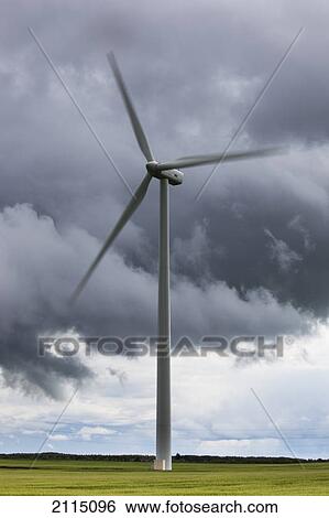 A wind turbine under a cloudy sky; northumberland england View Large Photo Image Stock Photograph - A wind turbine under a cloudy sky; northumberland england. Fotosearch