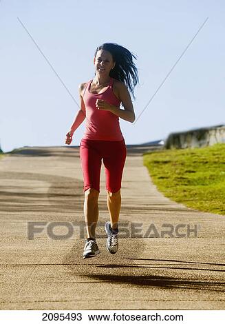 A woman running; gold coast queensland australia View Large Photo Image Stock Image - A woman running; gold coast queensland australia. Fotosearch