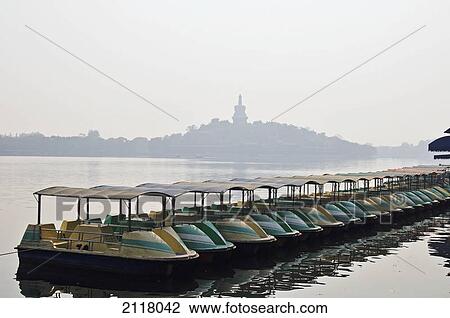 Boats in a row in the harbour; beijing china View Large Photo Image Stock Image - Boats in a row in the harbour; beijing china. Fotosearch