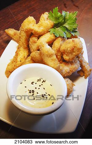 Chicken fingers with alioli sauce; gold coast queensland australia View Large Photo Image Stock Image - Chicken fingers with alioli sauce; gold coast queensland australia. Fotosearch