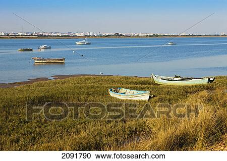 Estuary of the rio tinto in front of palos de la frontera; huelva province, andalusia, spain View Large Photo Image Stock Image - Estuary of the rio tinto in front of palos de la frontera; huelva province, andalusia, spain. Fotosearch