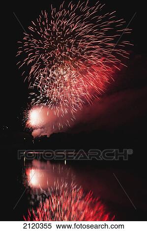 Fireworks displays reflecting off water; calgary alberta canada View Large Photo Image Stock Photography - Fireworks displays reflecting off water; calgary alberta canada. Fotosearch