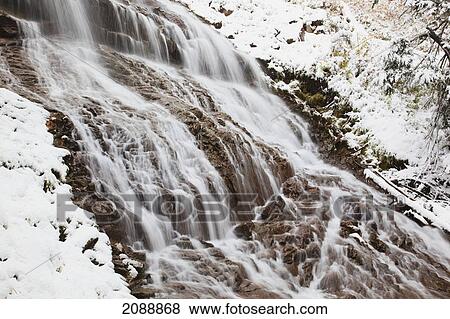 First snow in autumn along umbrella falls on mount hood in the oregon cascades; oregon, united states of america View Large Photo Image Stock Photo - First snow in autumn along umbrella falls on mount hood in the oregon cascades; oregon, united states of america. Fotosearch