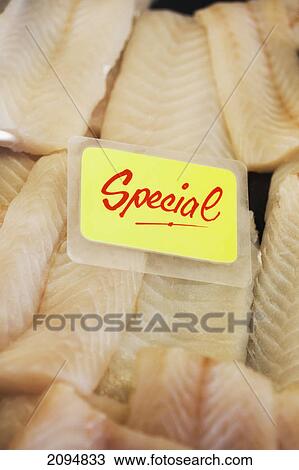 Stock Image - Fish on display with a sign marked 'special'; ballina new south wales australia. Fotosearch