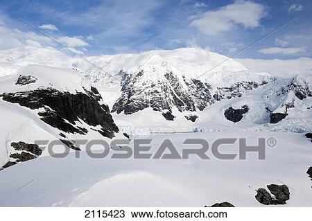 Stock Image - Glaciers on a frozen landscape; antarctica. Fotosearch