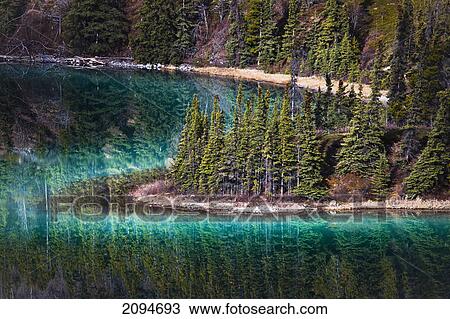 Glassy turquoise emerald lake; carcross, yukon, canada View Large Photo Image Stock Image - Glassy turquoise emerald lake; carcross, yukon, canada. Fotosearch