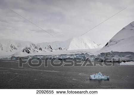 Stock Photography - Icebergs along the coastline; antarctica. Fotosearch