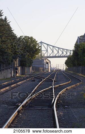 Jacques cartier bridge and railway tracks early morning; montreal quebec canada View Large Photo Image Stock Photo - Jacques cartier bridge and railway tracks early morning; montreal quebec canada. Fotosearch