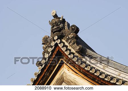 Stock Image - Japanese temple roof edge and gargoyle; kyoto, japan. Fotosearch