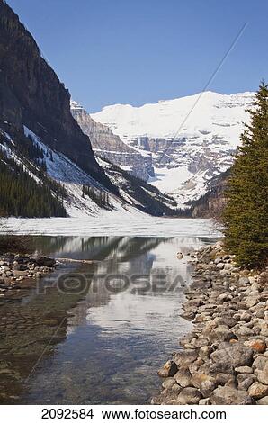 Lake louise in alberta's rocky mountain range; lake louise, alberta, canada View Large Photo Image Picture - Lake louise in alberta's rocky mountain range; lake louise, alberta, canada. Fotosearch