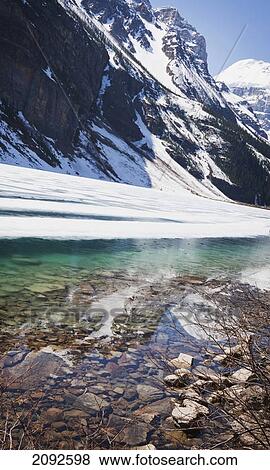 Lake louise in alberta's rocky mountain range; lake louise, alberta, canada View Large Photo Image Stock Photo - Lake louise in alberta's rocky mountain range; lake louise, alberta, canada. Fotosearch