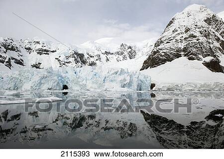 Mountains and glaciers reflected in the water; antarctica View Large Photo Image Stock Image - Mountains and glaciers reflected in the water; antarctica. Fotosearch