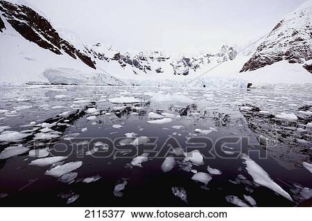 Mountains and glaciers reflected in the water; antarctica View Large Photo Image Stock Photo - Mountains and glaciers reflected in the water; antarctica. Fotosearch
