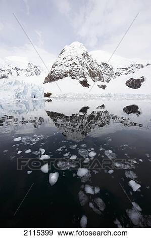 Mountains and glaciers reflected in the water; antarctica View Large Photo Image Stock Photo - Mountains and glaciers reflected in the water; antarctica. Fotosearch