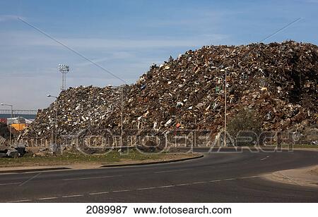 Piles of garbage beside the road; south shields, tyne and wear, england View Large Photo Image Stock Photo - Piles of garbage beside the road; south shields, tyne and wear, england. Fotosearch