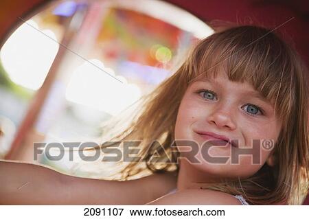 Stock Photo - Portrait of a girl; tarifa, cadiz, andalusia, spain. Fotosearch