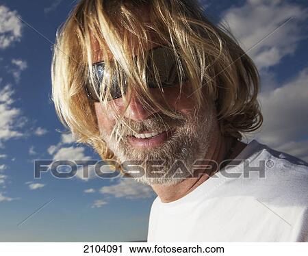 Portrait of a man wearing sunglasses; gold coast queensland australia View Large Photo Image Stock Image - Portrait of a man wearing sunglasses; gold coast queensland australia. Fotosearch