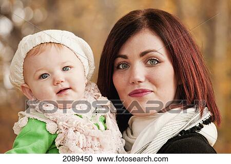Portrait of a mother and her baby daughter; edmonton, alberta, canada View Large Photo Image Stock Image - Portrait of a mother and her baby daughter; edmonton, alberta, canada. Fotosearch