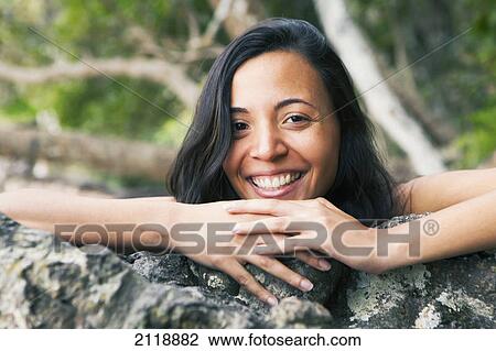Portrait of a woman on a tree branch; gold coast queensland australia View Large Photo Image Stock Image - Portrait of a woman on a tree branch; gold coast queensland australia. Fotosearch