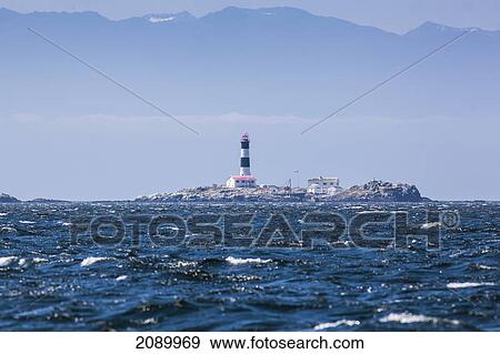 Race rocks lighthouse is situated on the juan de fuca strait near the southern tip of vancouver island; british columbia, canada View Large Photo Image Stock Photo - Race rocks lighthouse is situated on the juan de fuca strait near the southern tip of vancouver island; british columbia, canada. Fotosearch