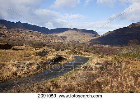 Road on a mountainous landscape; black valley, county kerry, ireland View Large Photo Image Stock Photo - Road on a mountainous landscape; black valley, county kerry, ireland. Fotosearch