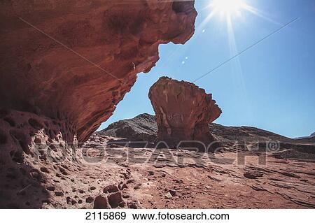 Rock formation and sunburst; timna park arabah israel View Large Photo Image Stock Photo - Rock formation and sunburst; timna park arabah israel. Fotosearch