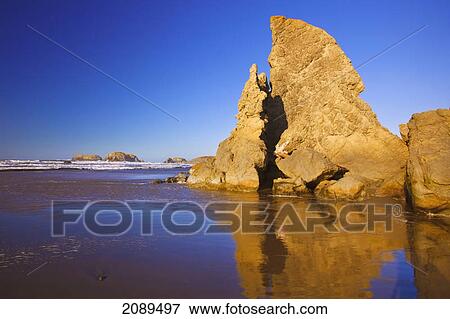 Stock Photo - Rock formations at low tide on bandon beach; oregon, united states of america. Fotosearch