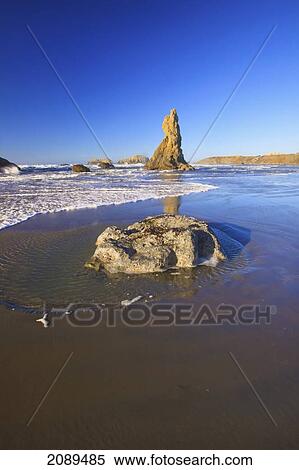 Stock Photography - Rock formations at low tide on bandon beach; oregon, united states of america. Fotosearch
