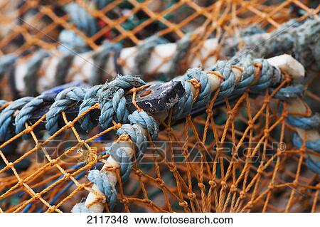 Stock Photo - Ropes on the edge of fishing traps; northumberland england. Fotosearch