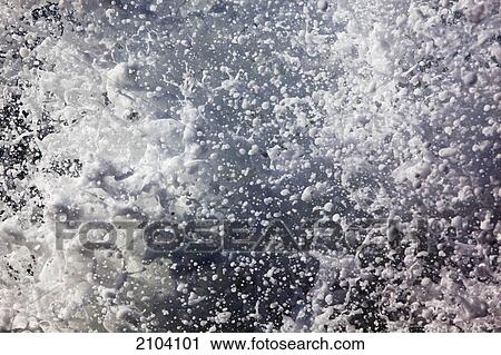 Stock Image - Splashing water; gold coast queensland australia. Fotosearch
