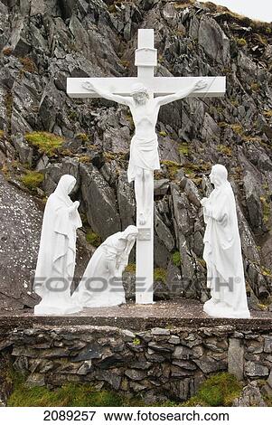 Statues of religious figures depicting the crucifixion; ireland View Large Photo Image Stock Photo - Statues of religious figures depicting the crucifixion; ireland. Fotosearch