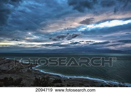 Stock Photo - Sunrise over the dead sea; israel. Fotosearch