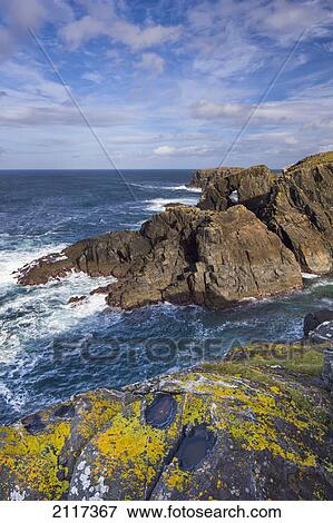 The west coast of lewis boasts a superb array of dramatic cliffs and sea stacks and the occasional natural arch; isle of lewis outer hebrides scotland View Large Photo Image Stock Photo - The west coast of lewis boasts a superb array of dramatic cliffs and sea stacks and the occasional natural arch; isle of lewis outer hebrides scotland. Fotosearch