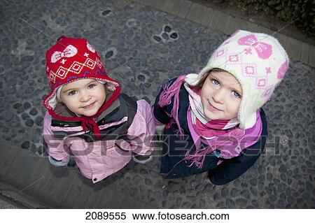 Stock Photography - Two young girls; beijing, china. Fotosearch
