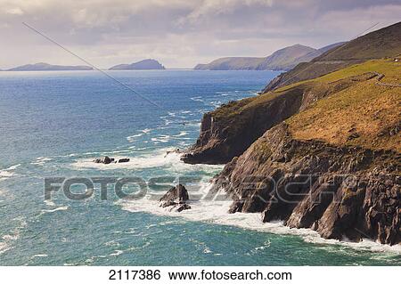 View along the coast to blasket islands on the horizon near slea head; dingle peninsula county kerry ireland View Large Photo Image Stock Photograph - View along the coast to blasket islands on the horizon near slea head; dingle peninsula county kerry ireland. Fotosearch