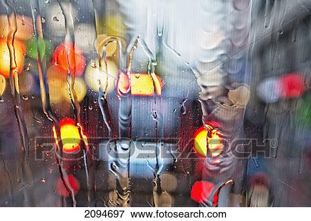 View of a car's tail lights through a wet windshield; amsterdam, holland View Large Photo Image Stock Photo - View of a car's tail lights through a wet windshield; amsterdam, holland. Fotosearch