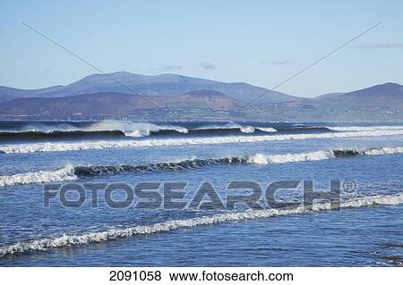 Waves coming into the shore at rosbeigh beach, near glenbeigh; county kerry, ireland View Large Photo Image Stock Photo - Waves coming into the shore at rosbeigh beach, near glenbeigh; county kerry, ireland. Fotosearch