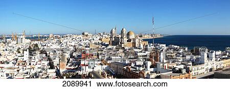 Whitewashed town along the coast and cadiz cathedral; cadiz, andalusia, spain View Large Photo Image Stock Image - Whitewashed town along the coast and cadiz cathedral; cadiz, andalusia, spain. Fotosearch