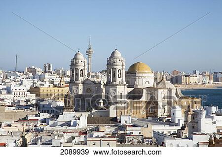 Whitewashed town along the coast and cadiz cathedral; cadiz, andalusia, spain View Large Photo Image Stock Photo - Whitewashed town along the coast and cadiz cathedral; cadiz, andalusia, spain. Fotosearch