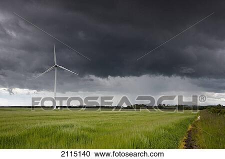 Wind turbine and storm clouds; northumberland england View Large Photo Image Stock Image - Wind turbine and storm clouds; northumberland england. Fotosearch