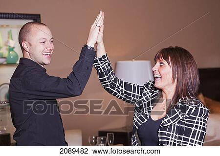 Stock Image - Young couple shopping for furniture and accessories; edmonton, alberta, canada. Fotosearch