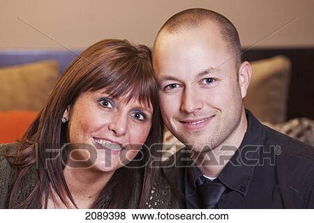 Stock Photo - Young married couple in love spending quality time together; edmonton, alberta, canada. Fotosearch