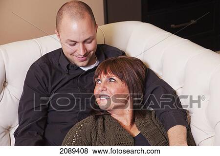 Stock Photo - Young married couple in love spending quality time together; edmonton, alberta, canada. Fotosearch